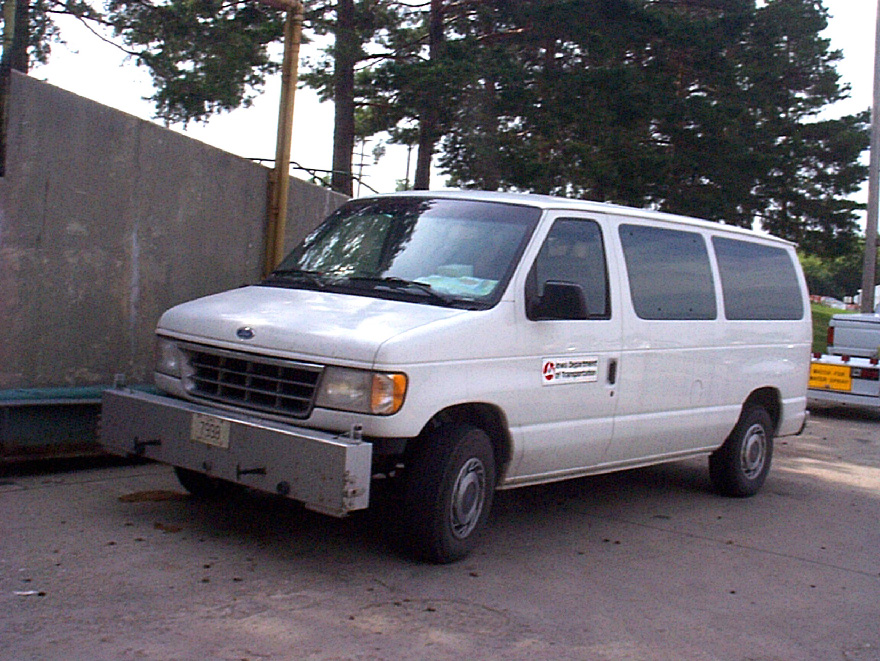 Van with South Dakota profilometer smoothness/International Roughness Index (IRI), and rut depth testing equipment attached