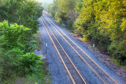 fence near rail tracks