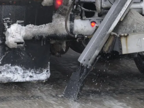 Brine being applied on road