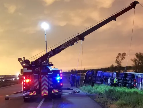 Tow truck getting semi out of ditch