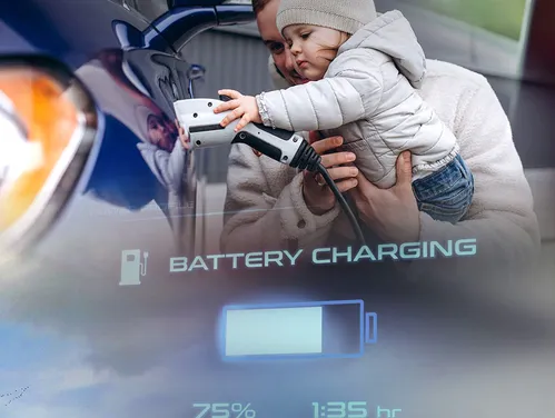 Father and daughter connecting charger