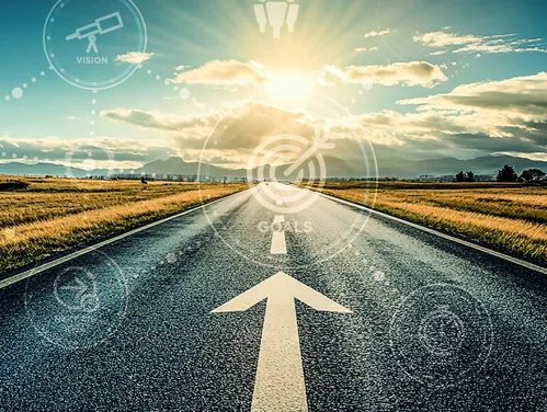 Road with arrow looking into sunshine