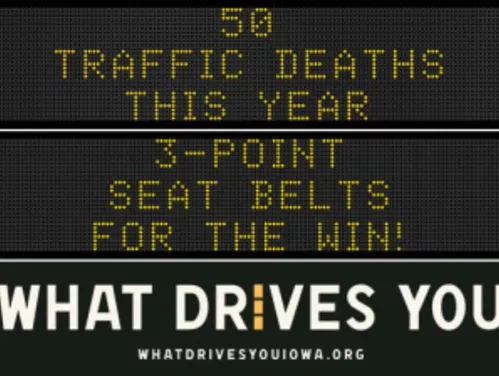 Traffic roadside graphic with text of the news article title.