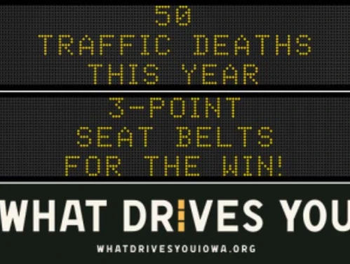 Traffic roadside graphic with text of the news article title.