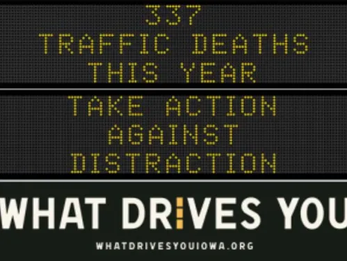 Traffic roadside graphic with text of the news article title.