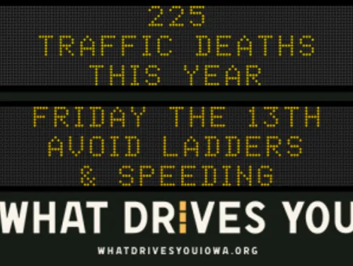 Traffic roadside graphic with text of the news article title.