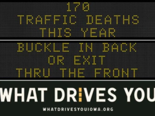 Traffic roadside graphic with text of the news article title.