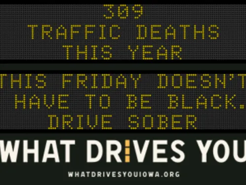 Traffic roadside graphic with text of the news article title.