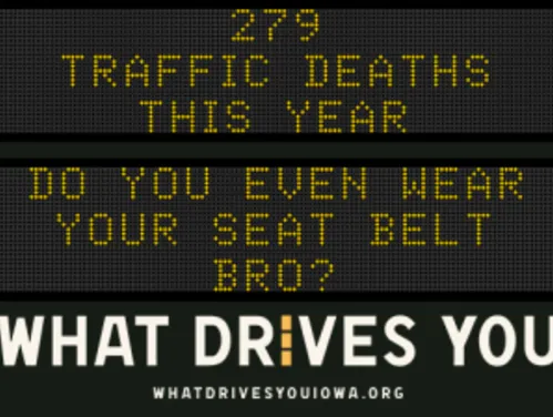 Traffic roadside graphic with text of the news article title.
