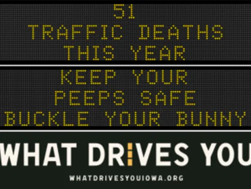 Traffic roadside graphic with text of the news article title.