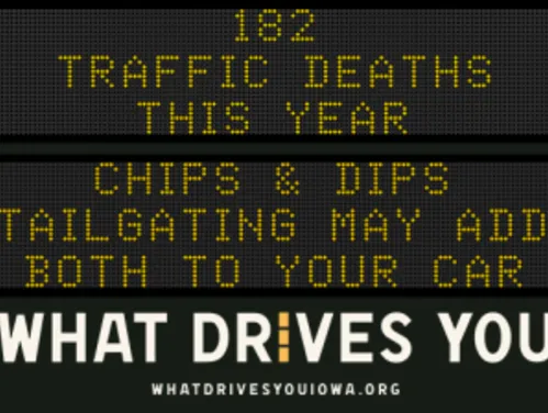 Traffic roadside graphic with text of the news article title.