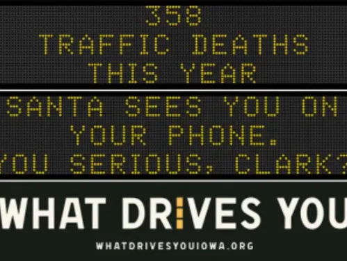 Traffic roadside graphic with text of the news article title.