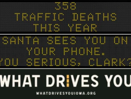 Traffic roadside graphic with text of the news article title.