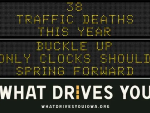 Traffic roadside graphic with text of the news article title.
