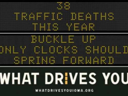Traffic roadside graphic with text of the news article title.