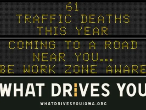 Traffic roadside graphic with text of the news article title.