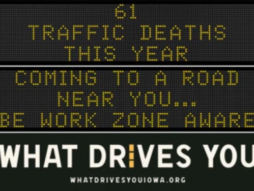 Traffic roadside graphic with text of the news article title.