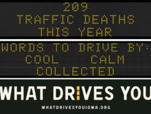 Traffic roadside graphic with text of the news article title.