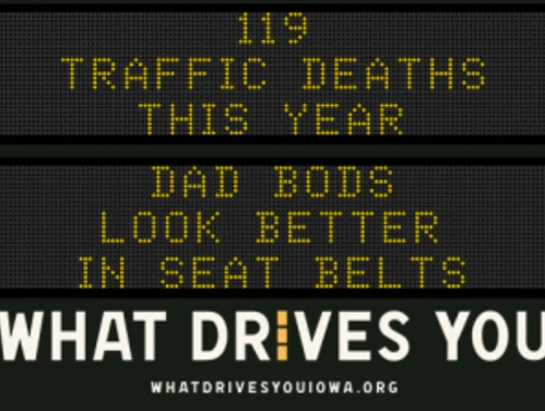 Traffic roadside graphic with text of the news article title.
