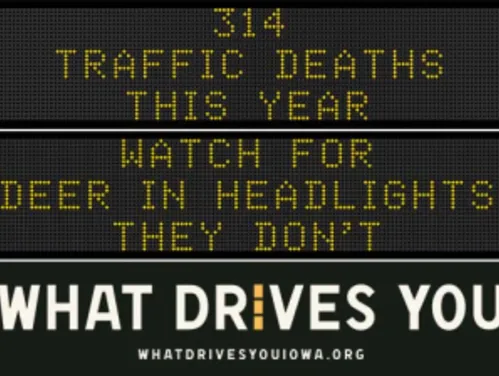 Traffic roadside graphic with text of the news article title.