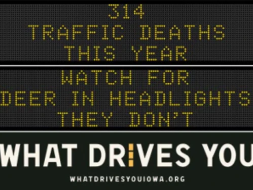 Traffic roadside graphic with text of the news article title.
