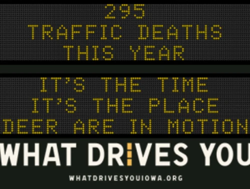 Traffic roadside graphic with text of the news article title.