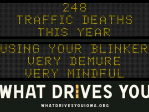 Traffic roadside graphic with text of the news article title.