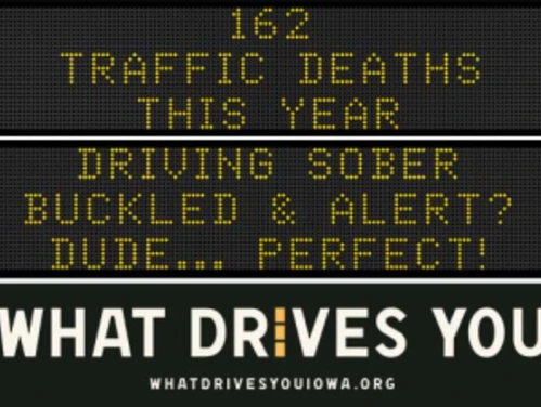 Traffic roadside graphic with text of the news article title.