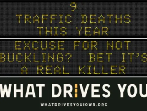 Traffic roadside graphic with text of the news article title.