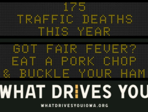 Traffic roadside graphic with text of the news article title.