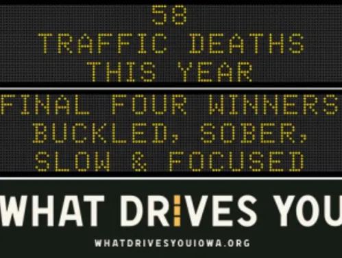 Traffic roadside graphic with text of the news article title.