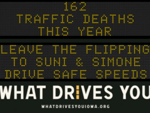 Traffic roadside graphic with text of the news article title.