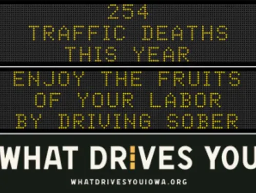 Traffic roadside graphic with text of the news article title.