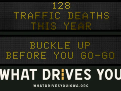 Traffic roadside graphic with text of the news article title.