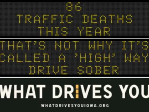 Traffic roadside graphic with text of the news article title.