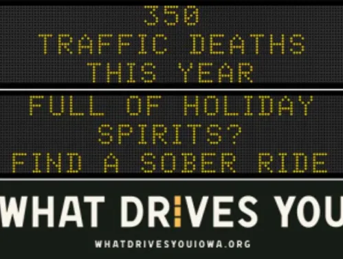 Traffic roadside graphic with text of the news article title.