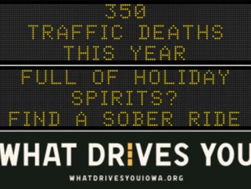 Traffic roadside graphic with text of the news article title.