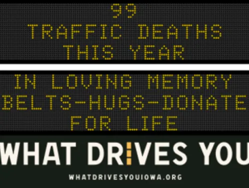 Traffic roadside graphic with text of the news article title.