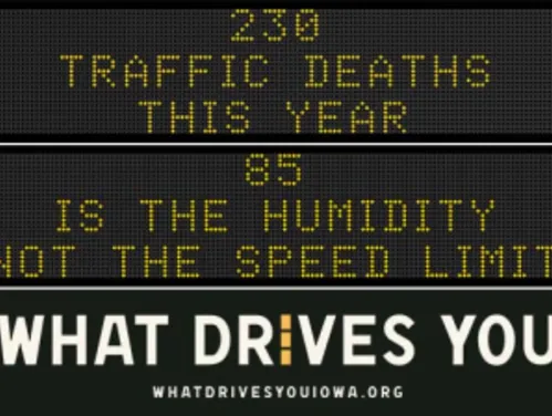 Traffic roadside graphic with text of the news article title.