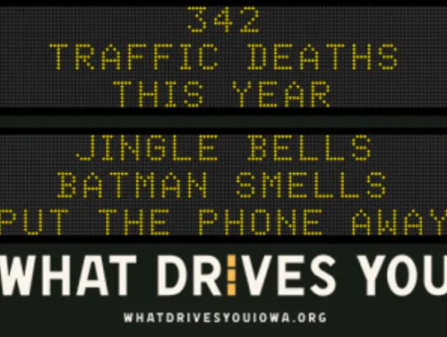 Traffic roadside graphic with text of the news article title.