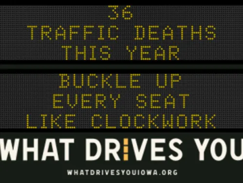 Traffic roadside graphic with text of the news article title.