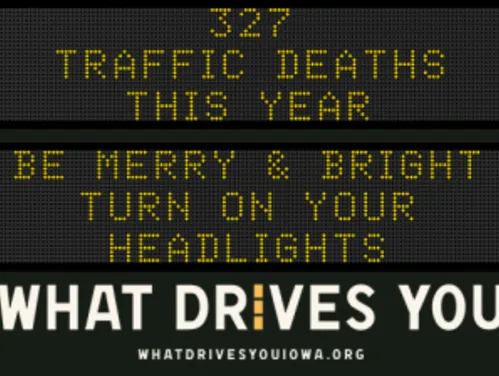 Traffic roadside graphic with text of the news article title.