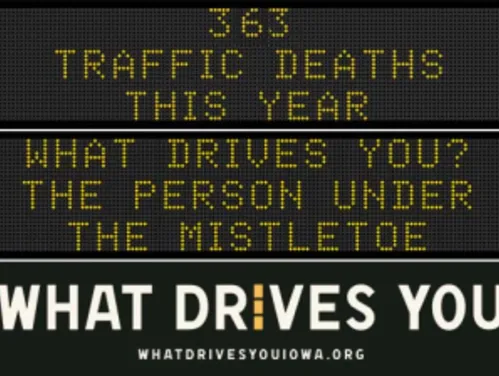 Traffic roadside graphic with text of the news article title.