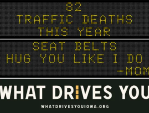 Traffic roadside graphic with text of the news article title.