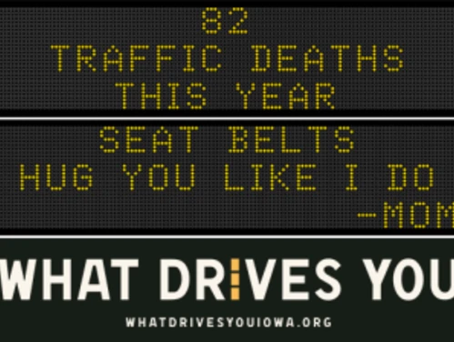 Traffic roadside graphic with text of the news article title.