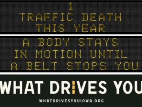 Traffic roadside graphic with text of the news article title.