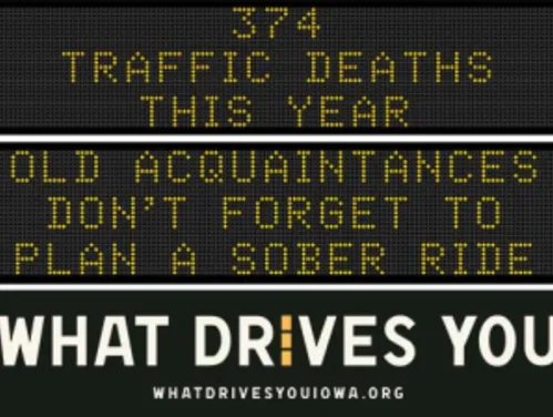 Traffic roadside graphic with text of the news article title.