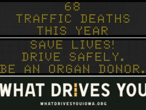 Traffic roadside graphic with text of the news article title.