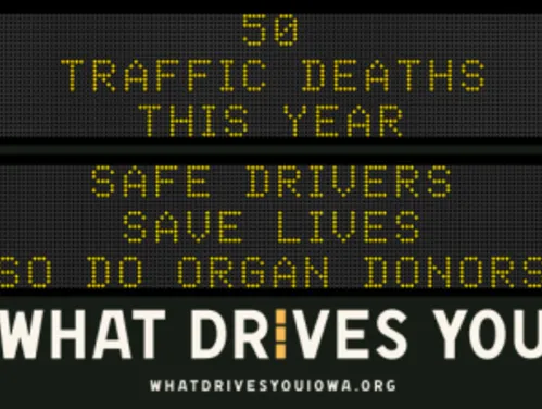 Traffic roadside graphic with text of the news article title.