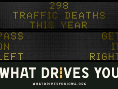 Traffic roadside graphic with text of the news article title.